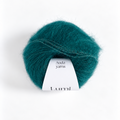 A ball of teal green yarn with a white paper label that reads 'Auda yarns Lumi', photographed on a clean white background.